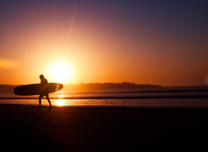 Surfer in sunset